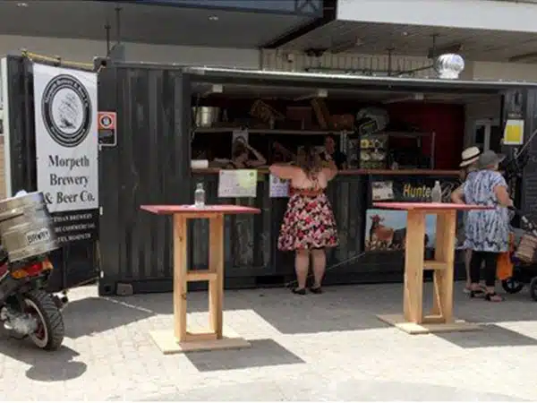 With A Pop-Up Container Shop, You Can Follow The Crowds And Start Trading Immediately. This Pop-Up Container Shop Was Used By Maitland Council At Their Yearly ‘Taste’ Event As A Makeshift Bar Called The Hunter And The Hare. Fully Insulated, It Includes A Lockable Servery Window, Fold Down Deck, Work Bench With Kitchen Sink, Flush Fit Personnel Door With Deadlock And Waterproof Floor With Floor Waste Outlet. This Pop-Up Container Shop Is Perfect For Restaurants, Cafes And Bars, But They’re Also Ideal For Pop-Up Retail Outlets Featuring Goods Like Clothing, Shoes, Accessories, Homewares, And Arts &Amp; Crafts. A Big Advantage Of These Units Is That They Are Extremely Secure And Have The Ability Of Being Transported From Site To Site. Choose From Three Standard 10′, 20′ And 40′ Container Sizes. Call Us Today And Speak To One Of Our Friendly Staff At Port Shipping Containers For A Quote And Be On Your Way To Selling Today!